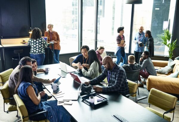 A group of co-workers lounging in a room