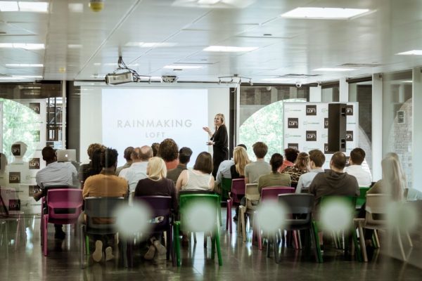 a ceo showing her presentation to her staff