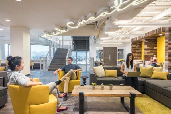 people enjoying a stylish office lounge