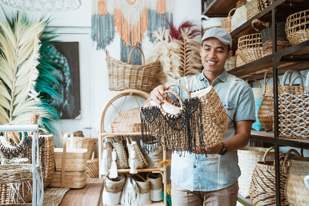 Man looking at the woven bag