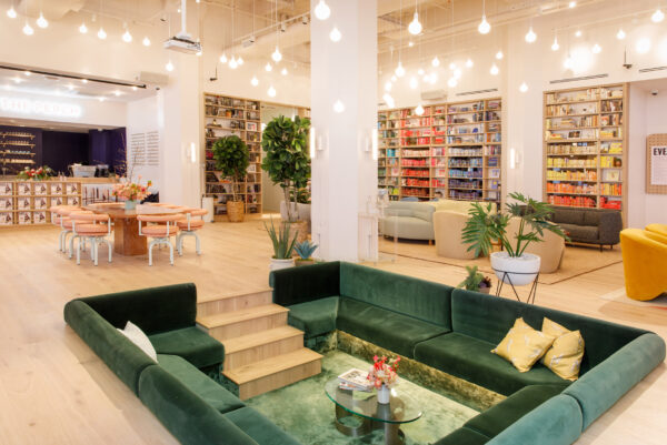 Huge couch in the middle of a coworking space