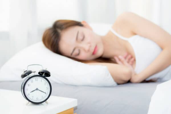 an asian woman sleeping