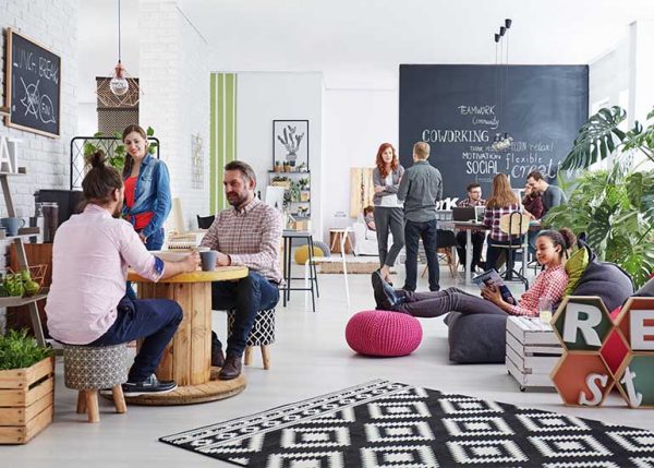 employees enjoying the amenities at a coworking space
