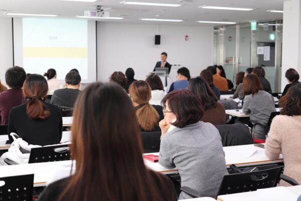 people gathered in a corporate conference