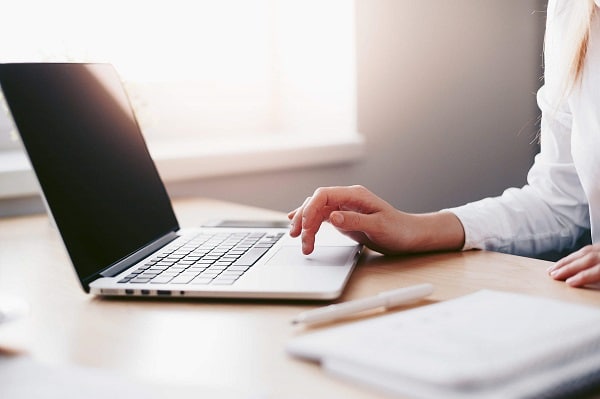A woman using her laptop