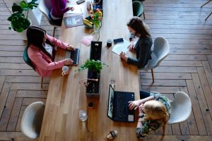 people working in office with mask