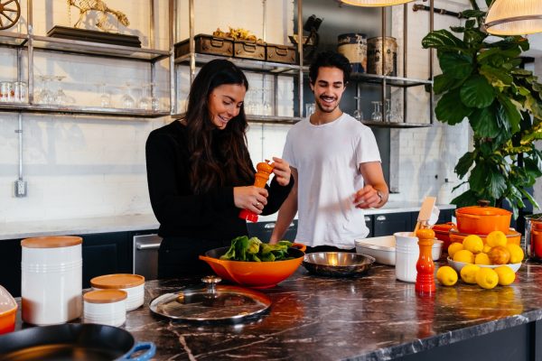 couple cooking in Kitchen