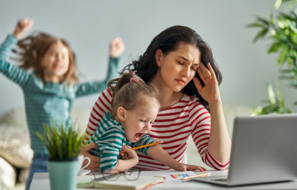 a problematic mother trying to work from home while her two daughters are being a distraction