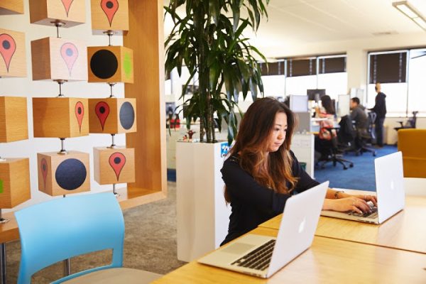 a businesswoman working in a shared workingspace